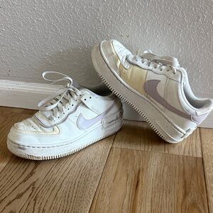 Nike AirForce 1 White and Cream Sneakers with Subtle Purple Details